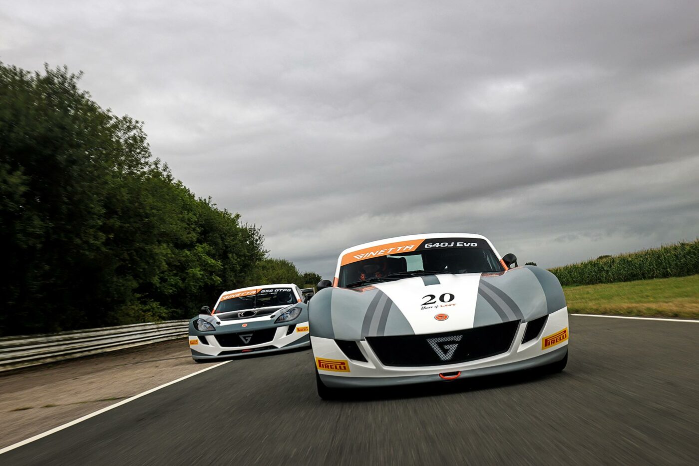 two Ginetta race cars on track